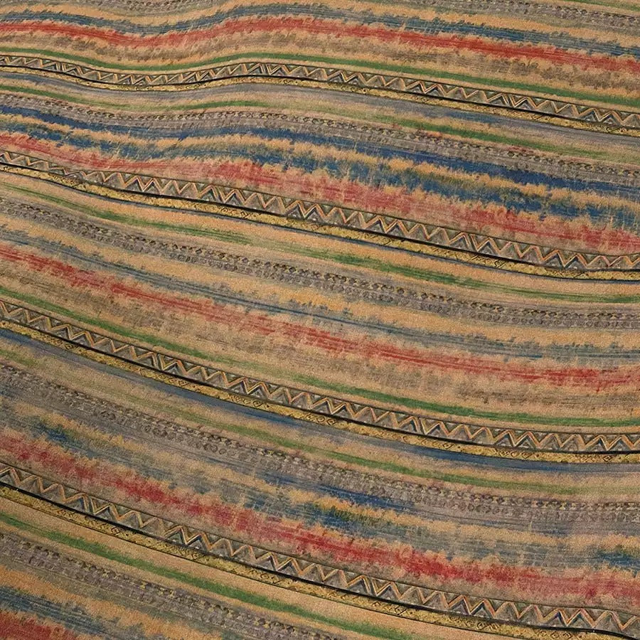 a close-up view of a colorful, striped fabric with a repeating pattern of horizontal stripes in various colors, including red, blue, green, and yellow.