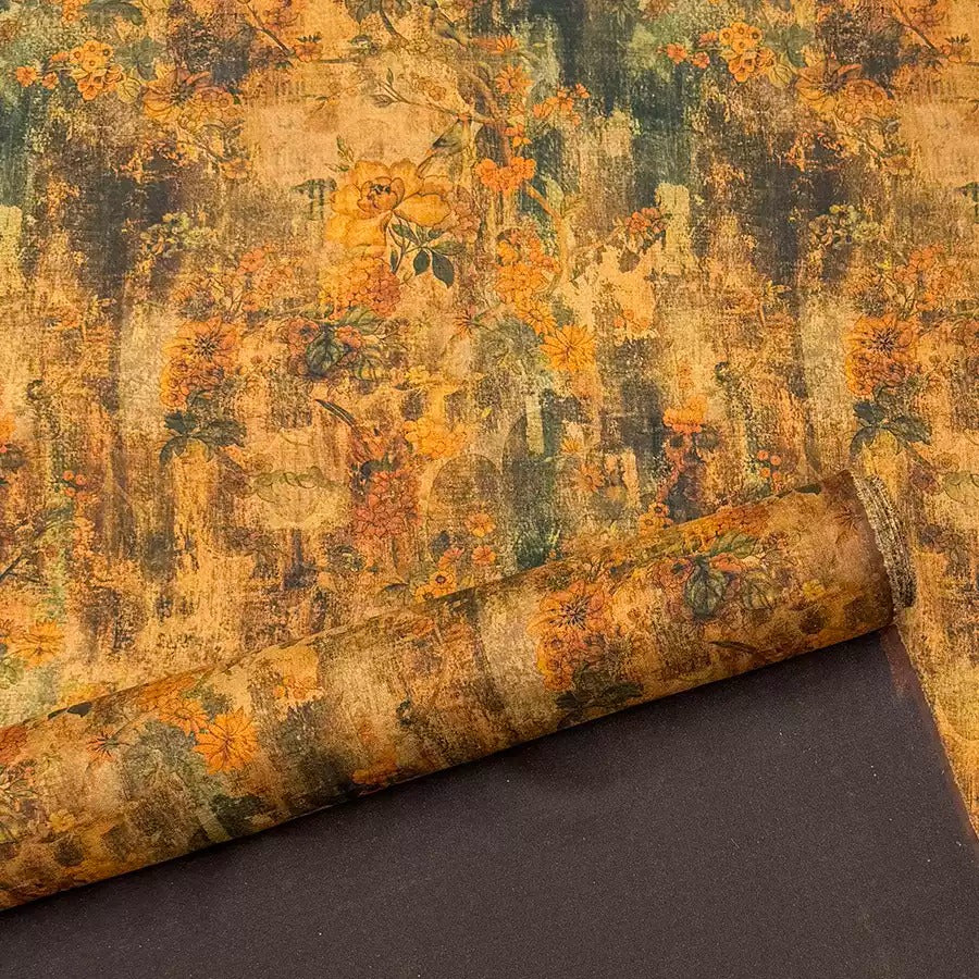 a close-up view of a textured, floral-patterned wallpaper or fabric with a warm, earthy color palette.