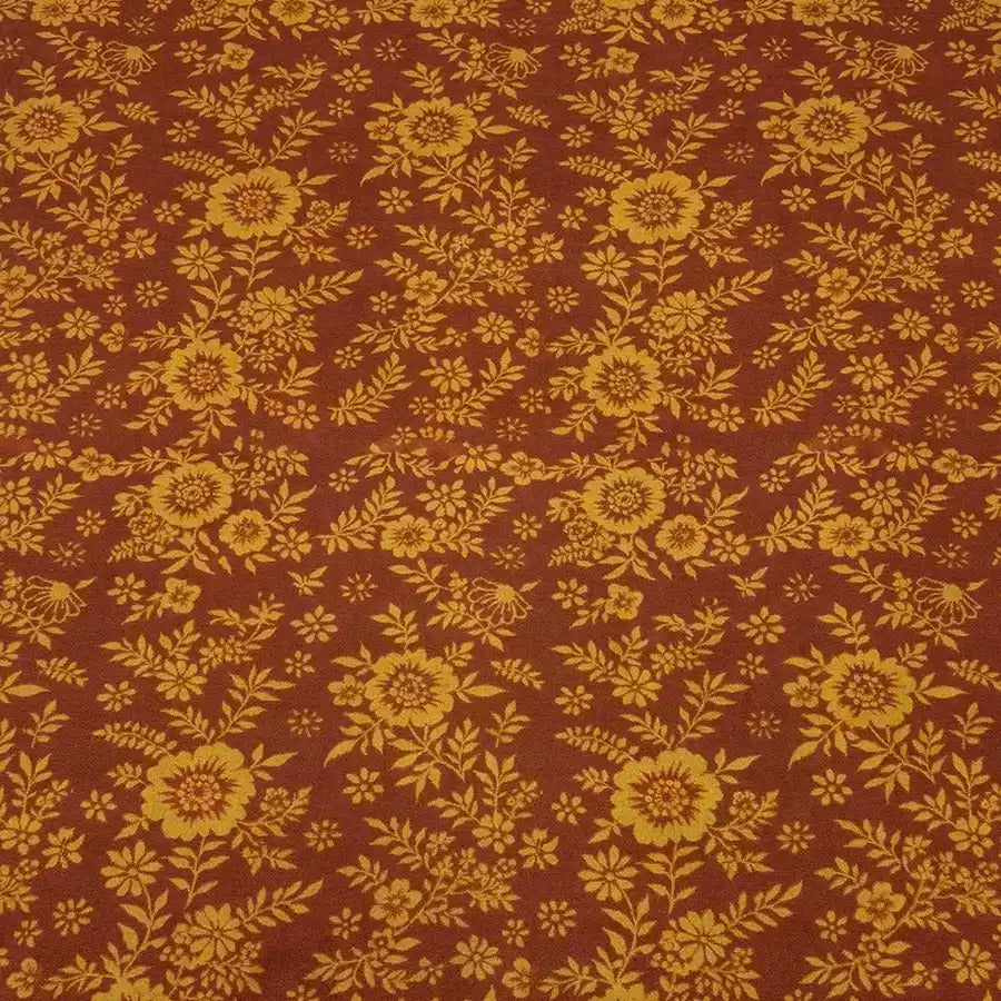 a close up of a red and yellow floral pattern