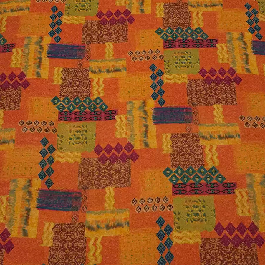 The image is a vibrant and colorful collage of various patterns and shapes, including geometric designs, floral motifs, and abstract elements, all set against a warm orange background.