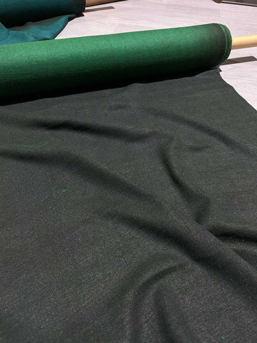 a close up of a piece of mud tussah silk #color_emerald