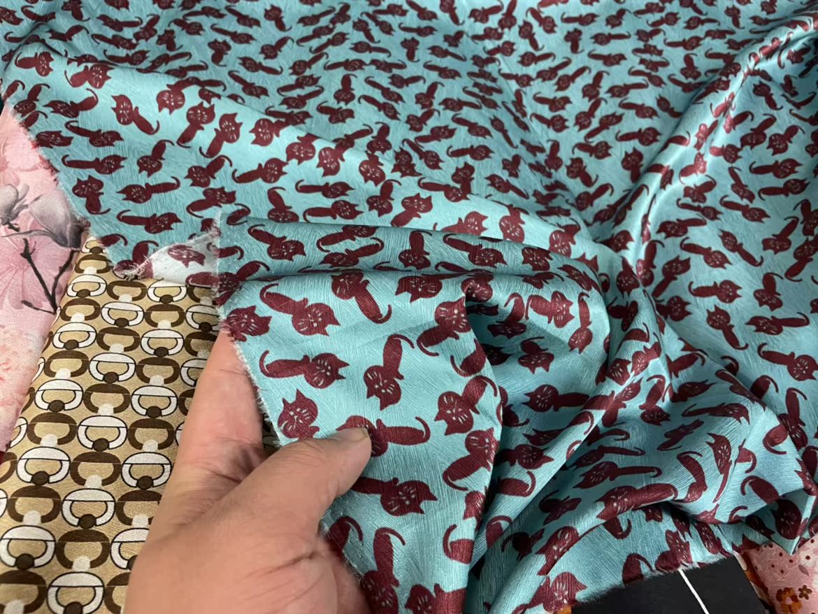 KATMAO - 19 Momme Reddish Brown Cartoon Cat on Blue Background Pattern Digital Print Stretch Silk Satin Fabric - 108cm wide by the Yard