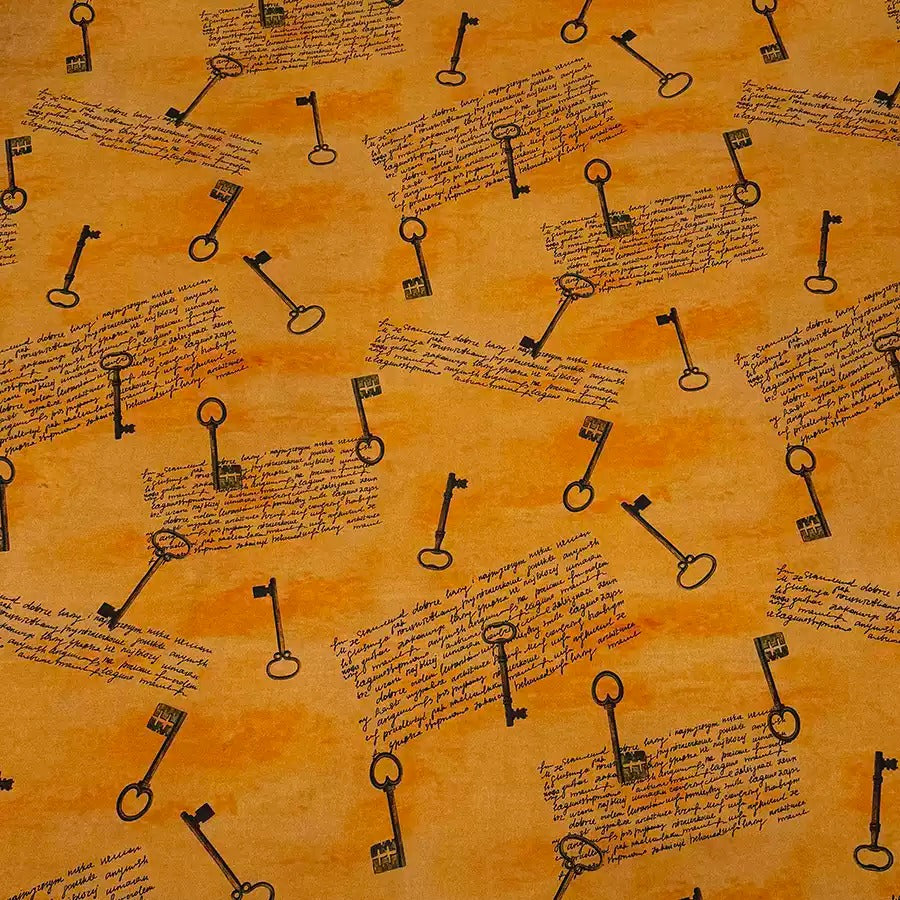 a repeating pattern of black keys on an orange background.