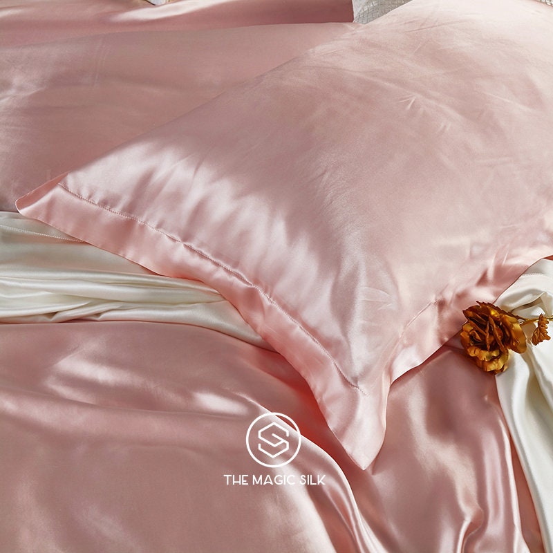 Luxurious Silk Bedding Set 4 pieces. Charmeuse silk bedding set in Sakura Pink. Made in 25 momme 100% Anti-Allergic Mulberry Silk.