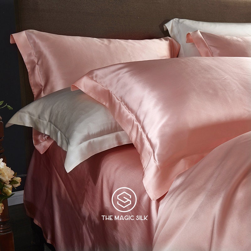 Luxurious Silk Bedding Set 4 pieces. Charmeuse silk bedding set in Sakura Pink. Made in 25 momme 100% Anti-Allergic Mulberry Silk.