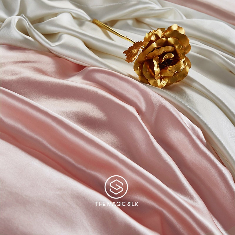 Luxurious Silk Bedding Set 4 pieces. Charmeuse silk bedding set in Sakura Pink. Made in 25 momme 100% Anti-Allergic Mulberry Silk.