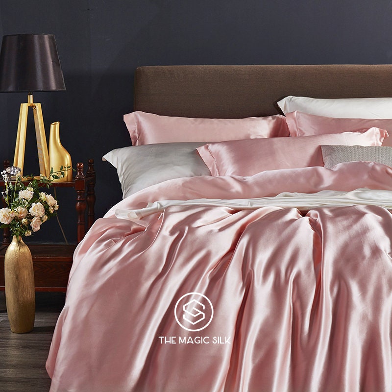 Luxurious Silk Bedding Set 4 pieces. Charmeuse silk bedding set in Sakura Pink. Made in 25 momme 100% Anti-Allergic Mulberry Silk.