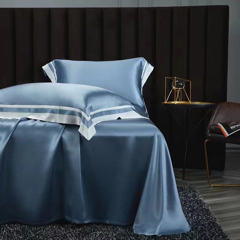 2022 New Presidential Suite set 4 pieces. Charmeuse silk bedding set in Dust Blue Made in 25 momme 100% Anti-Allergic Mulberry Silk.