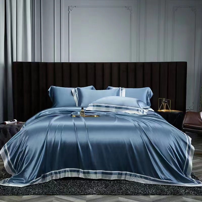 2022 New Presidential Suite set 4 pieces. Charmeuse silk bedding set in Dust Blue Made in 25 momme 100% Anti-Allergic Mulberry Silk.