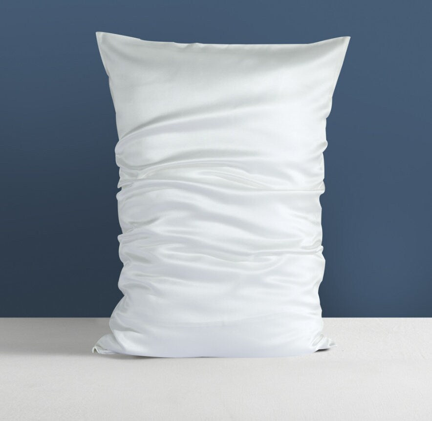 a page with a picture of a bed and pillows