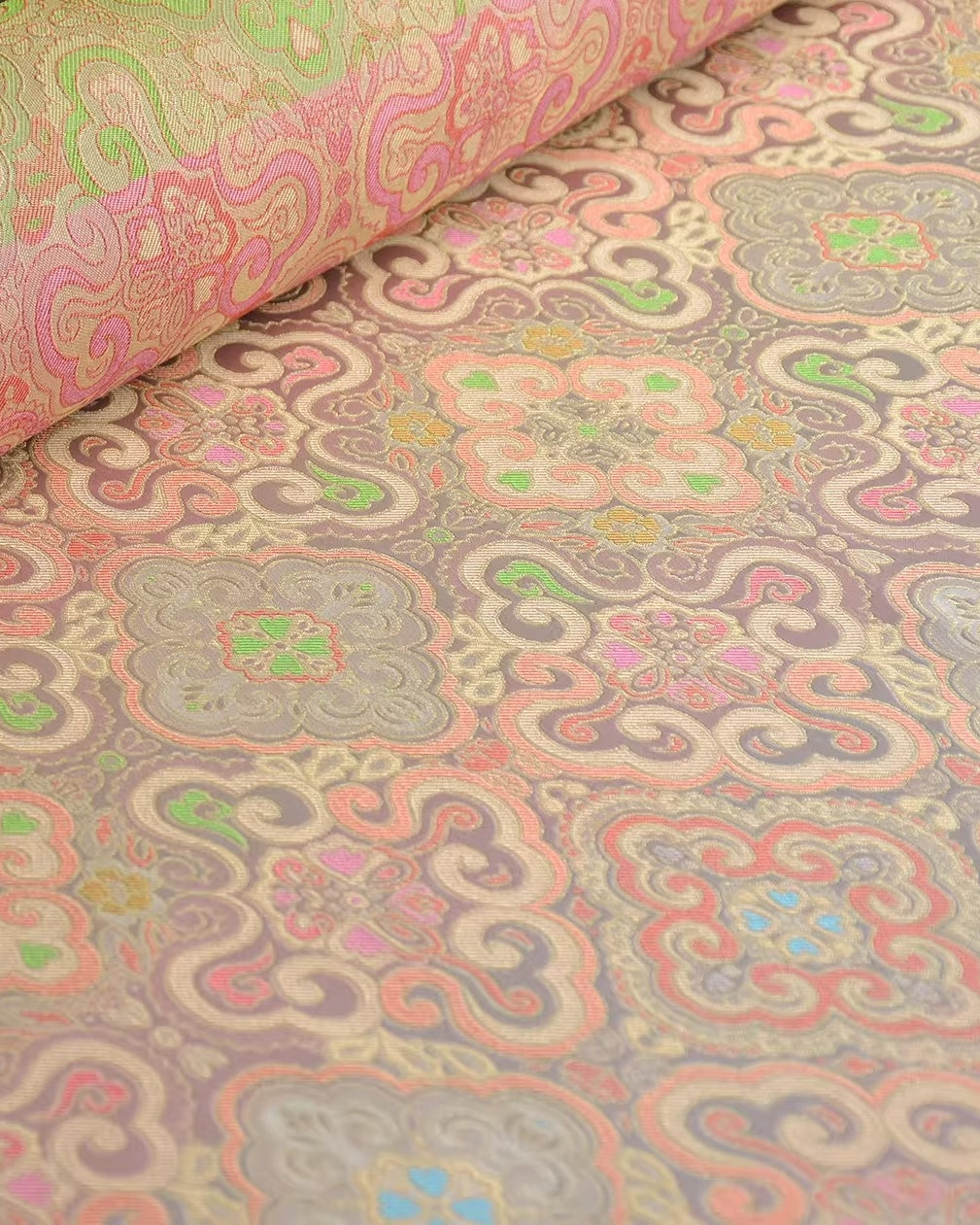 Classical Chinese silk fabrics showing refined woven textures and traditional silk structures