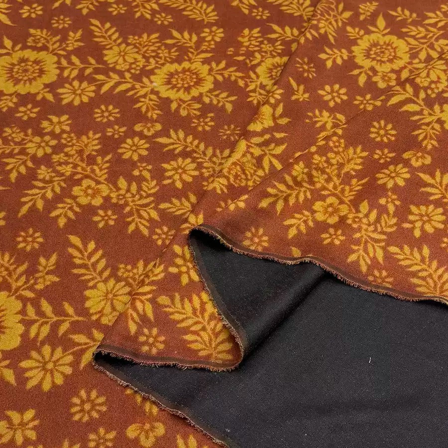 a piece of fabric with a flower pattern on it