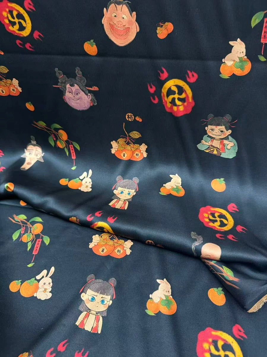 The image is a close-up of a fabric with a repeating pattern of cartoon-style characters and objects, including a smiling face, a rabbit, and various fruits and vegetables.
