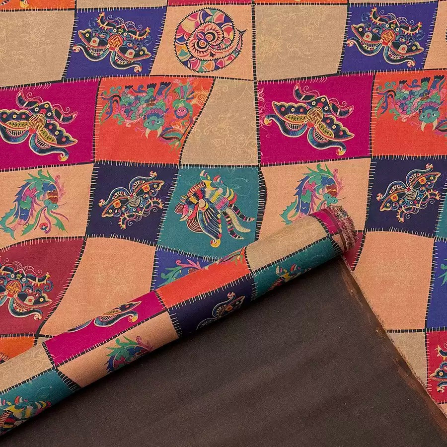 a vibrant and colorful patchwork fabric with a repeating pattern of various shapes and designs, including animals, flowers, and geometric patterns. The fabric appears to be a textile or textile-like material, with a rich and diverse color palette.
