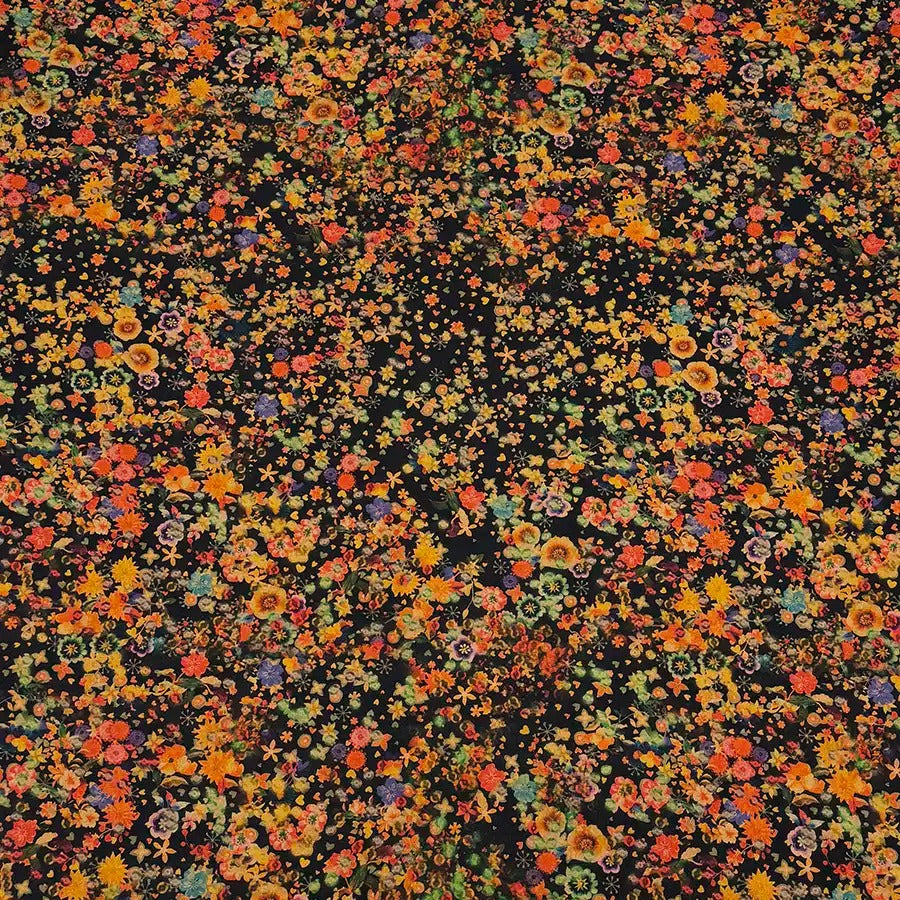 The image is a collage of various colorful flowers and plants, creating a vibrant and lively visual effect.