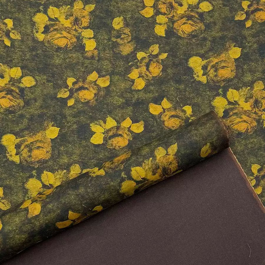 a close-up view of a fabric with a floral pattern of yellow flowers against a dark green background.
