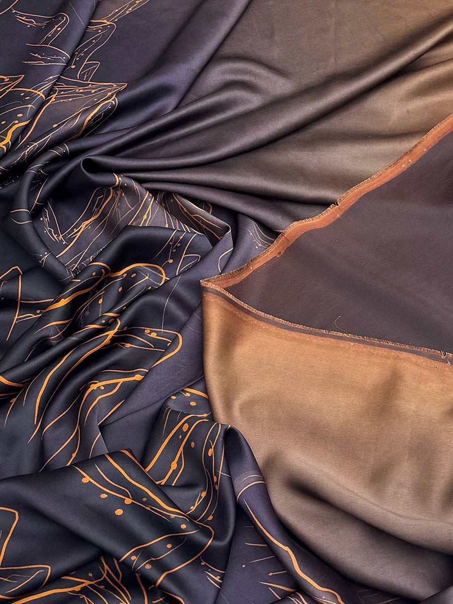 The image is a close-up view of a fabric with a pattern of orange and black lines, creating a textured and visually interesting surface.