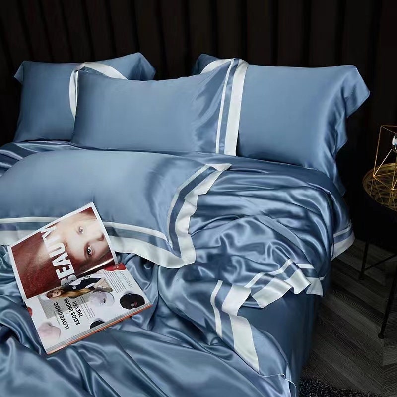 2022 New Presidential Suite set 4 pieces. Charmeuse silk bedding set in Dust Blue Made in 25 momme 100% Anti-Allergic Mulberry Silk.