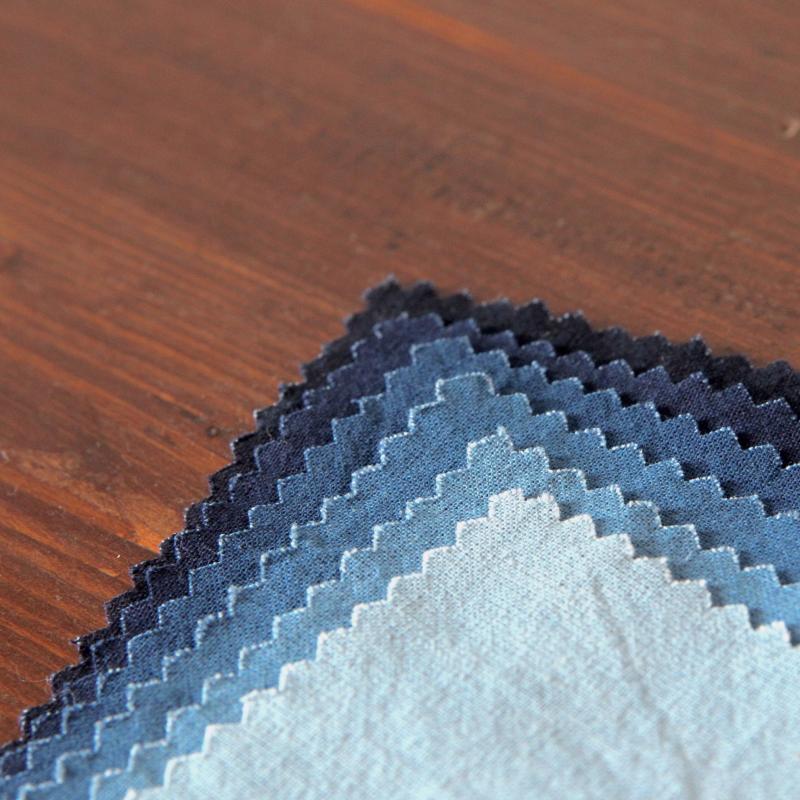 Indigo-dyed cotton fabric — six-shade range and texture